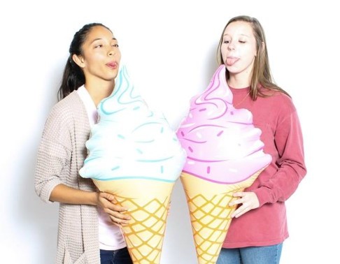 girls licking ice cream